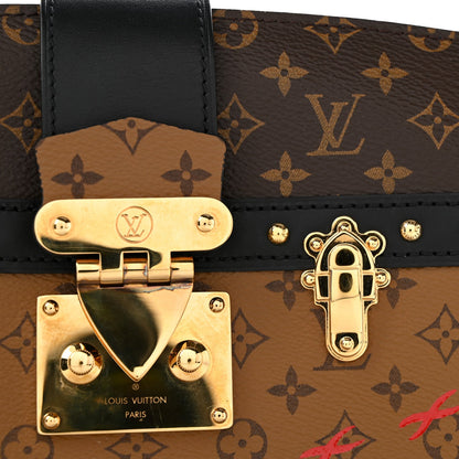Reverse Monogram Trunk Clutch