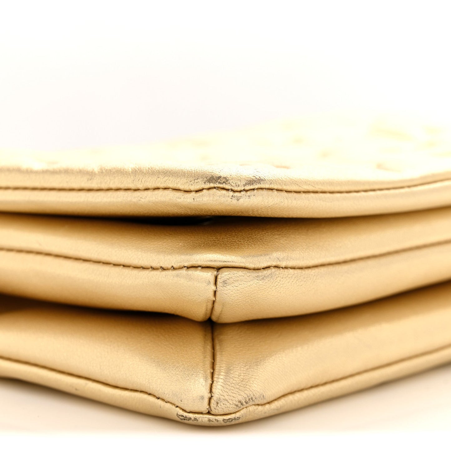 Metallic Lambskin Embossed Monogram Pochette Coussin Gold