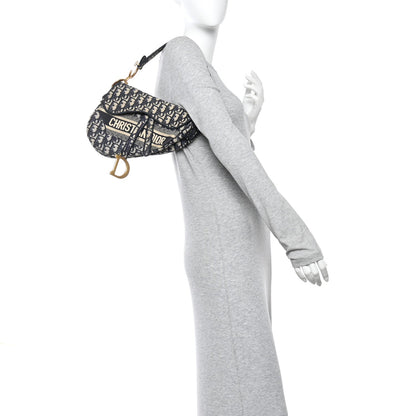 Oblique Embroidered Saddle Bag Blue