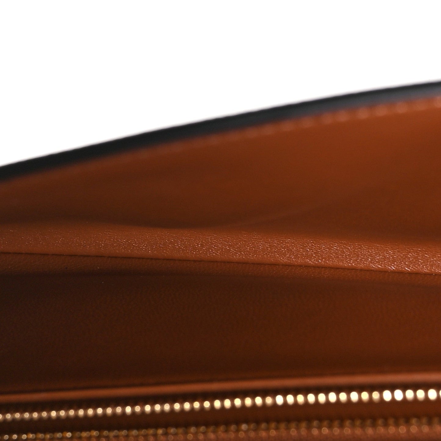 Triomphe Canvas Asymmetric Clutch Tan