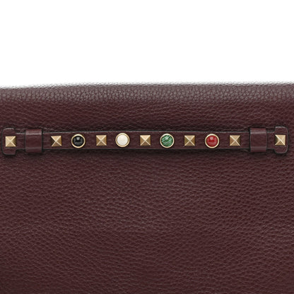 Pebbled Calfskin Rockstud Rolling Wristlet Clutch  Rubin