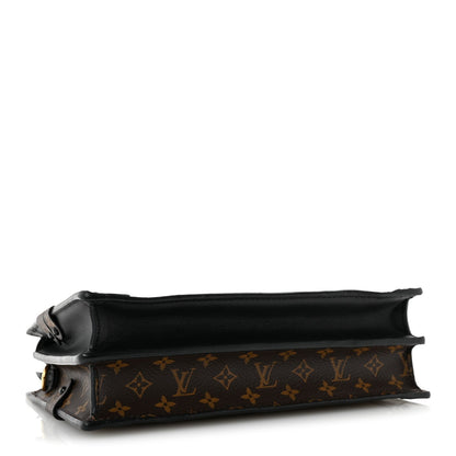 Reverse Monogram Trunk Clutch