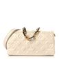 Lambskin Embossed Monogram Pochette Coussin Crossbody Creme