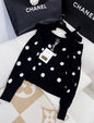 Chanel 23AW black camellia off-shoulder bow top