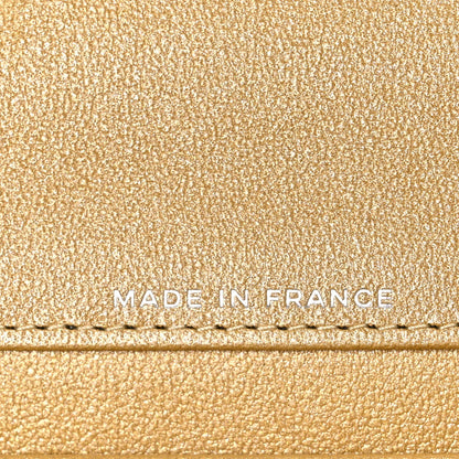 Metallic Caviar Quilted Top Handle Flap Clutch With Chain Gold
