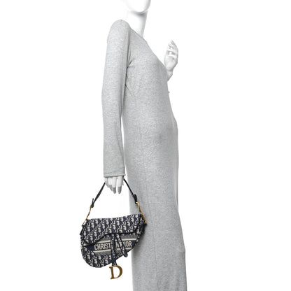 Oblique Embroidered Saddle Bag Blue