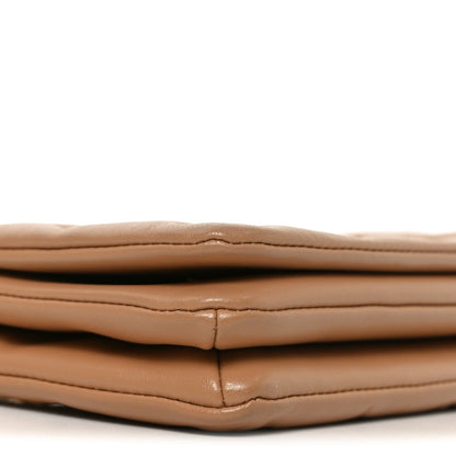 Lambskin Embossed Monogram Pochette Coussin Camel