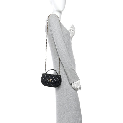 Shiny Aged Calfskin Quilted Top Handle Clutch With Chain Black