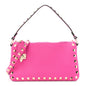 Pebbled Calfskin Small Rockstud Flip Lock Shoulder Bag Fuxia