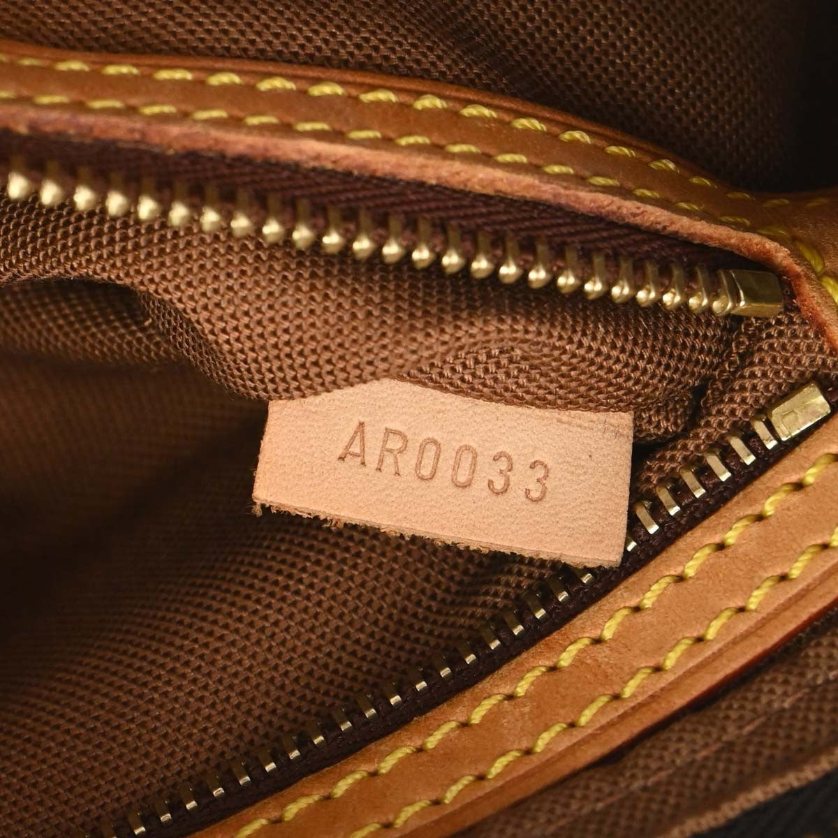 Louis Vuitton Trotteur Handbag Monogram Canvas Brown Canvas Clutche & Pouche Bag (   )